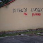 Murales con scritto "Difendi Livorno dai Livornesi"